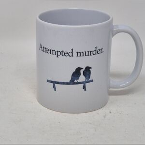 'Attempted Murder' White Ceramic Mug with crow Design